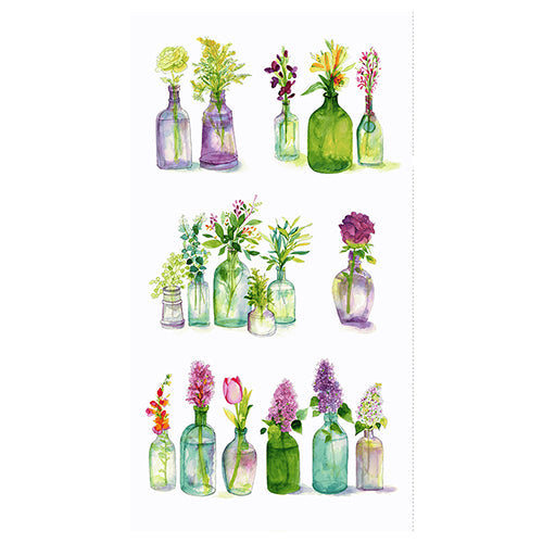 Cotton fabric panel by Clothworks features 17 various-colored vases with flowers like tulips and lilac in a water-color fashion on a white background