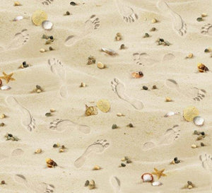 
This cotton fabric features footprints in the sand. Available at Colorado Creations Quilting