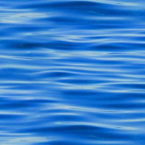 This cotton fabric of deep blue water has small waves