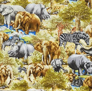 This fabric features elephants, zebras, rhinos and hippos on an African meadow of wild grasses.