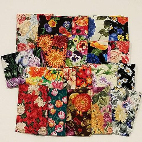 This fat quarter bundle has a selection of garden-variety flower cotton fabrics like pansy, iris, sunflower, daisy, hydrangea and geranium 