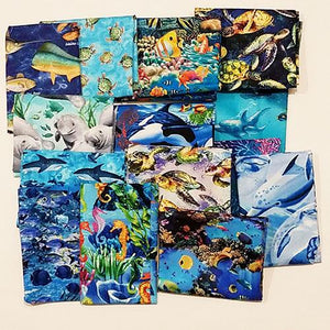 This cotton fat quarter bundle has a selection of sea life fabrics like dolphins, sharks, tropical fish, manatees and sea horses.