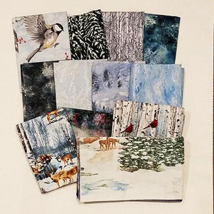 This bundle of fat quarters features a selection of snow related fabrics such as snow-ladened trees and forests as well as snow flakes.