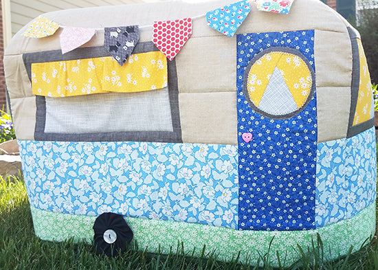 3-d sewing machine cover with bright curtains, door and button embellishments
