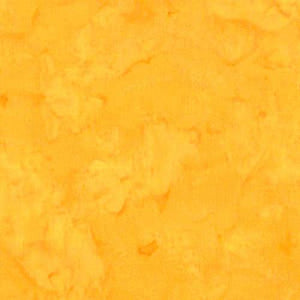 Mottled Golden Yellow Batik Cotton Fabric available at Colorado Creations Quilting