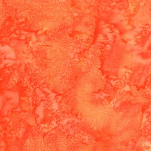 Mottled Pumpkin Orange Batik Cotton Fabric available at Colorado Creations Quilting