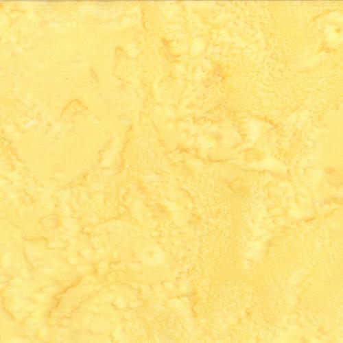 Mottled Blonde Ale Yellow Batik Cotton Fabric available at Colorado Creations Quilting