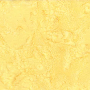 Mottled Blonde Ale Yellow Batik Cotton Fabric available at Colorado Creations Quilting