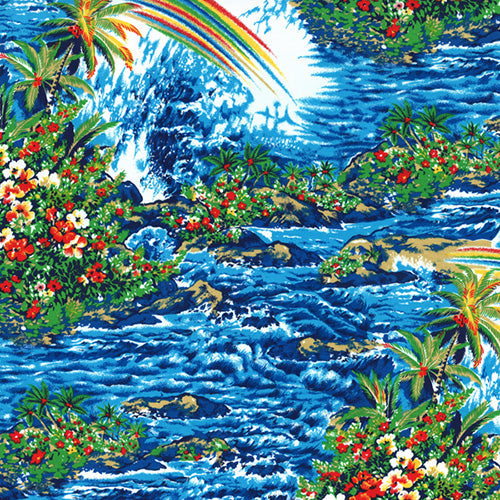 This cotton fabric features 10" wide rainbow over ocean waves, palm trees and tropical plants. Available at Colorado Creations Quilting