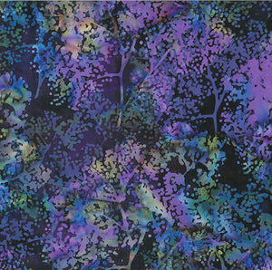 This batik cotton features deep purple branches with "dotty leaves". 