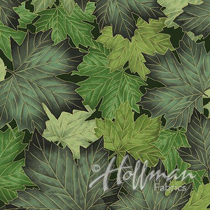 Packed maple leaves in shades green
