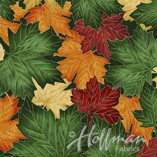 Packed maple leaves in shades of red, green and gold
