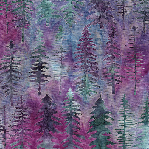 This batik fabric features evergreens in various shapes that stand about 4" tall on a background with a rich mix of violet and blue. 