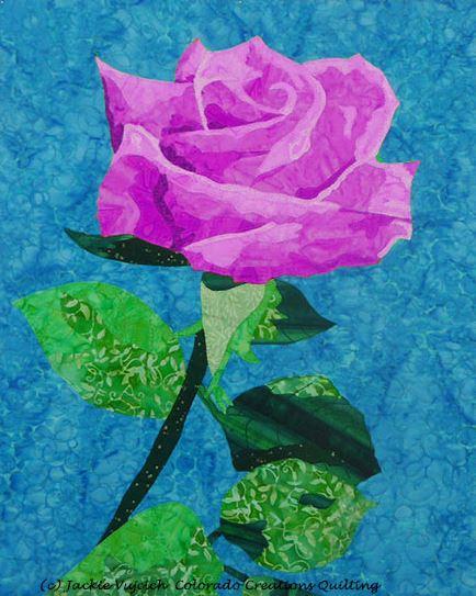 Fabric kit displays of all violet (purple), green and blue fabrics needed to complete Rose by Another Name quilt pattern available at Colorado Creations Quilting