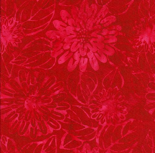 This batik tonal fabric featuring large flowers on an apple red-colored background