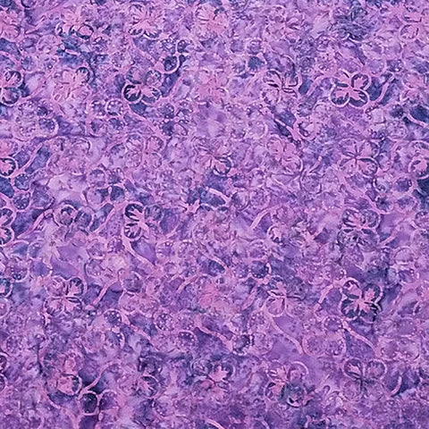 This batik fabric features grapes and leaves the color of purple jam. 