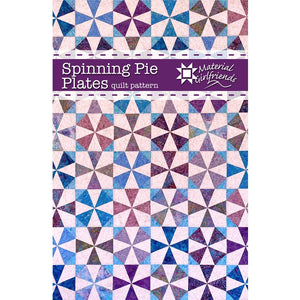 Spinning Pie Plates Quilt Pattern  features a kaleidoscopic quilt in blues, purples and pinks.  The "kite" pieces give it that kaleidoscope look.