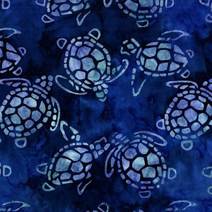 This tonal batik fabric features sea turtles on a rich blue background.  
