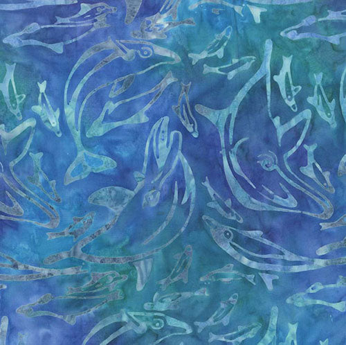 This tonal batik fabric features dolphins on a rich blue background.  
