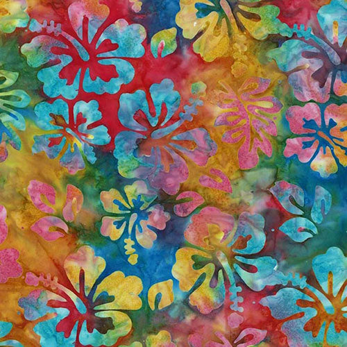 This batik fabric features hibiscus flowers on a vibrant rainbow-colored background.
