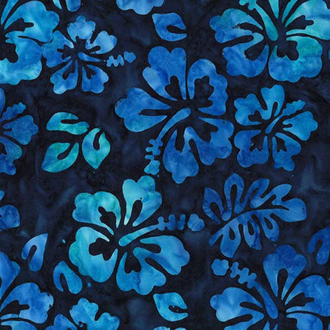 This batik tonal fabric features hibiscus flowers on a rich navy background.
