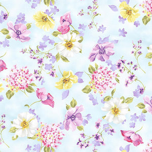 Delicate flowers in pastel colors of pink, purple, white and yellow on a blue background Available at Colorado Creations Quilting