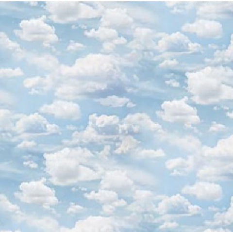 This 100% cotton quilting fabric features a light blue sky with cloulds available at Colorado Creations Quilting