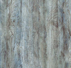 This flannel cotton fabric features texture in blues, grays, browns and taupes that resemble wood.  