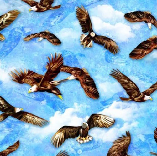 This cotton fabric features bald headed eagles in flight against a brilliant blue sky.  