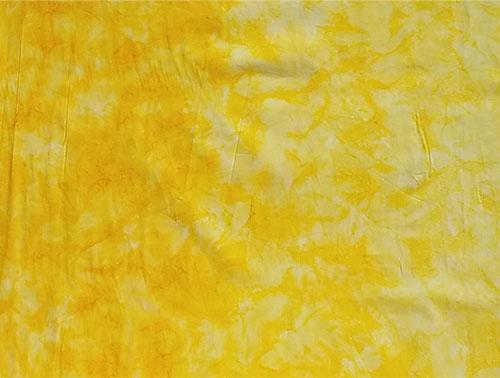 Mottled yellow batik cotton fabric. Available at Colorado Creations Quilting