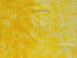 Mottled yellow batik cotton fabric. Available at Colorado Creations Quilting