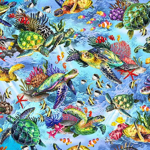 This cotton fabric features sea turtles, seahorses, coral, clown fish and other tropical fish in a light blue water. Available at Colorado Creations Quilting