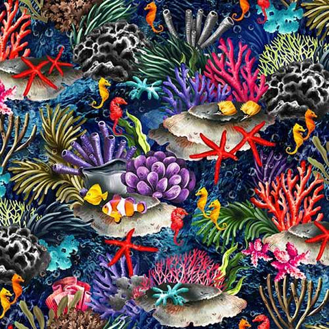 This cotton fabric features brightly-colored images of tropical fish such as clown fish and seahorses as they swim in deep blue water among coral and seashells along the sea floor.  Available at Colorado Creations Quilting