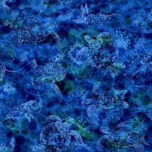 This cotton fabric features sea turtles in rich blue. Available at Colorado Creations Quilting