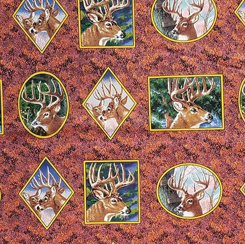Elk portrait vignettes are portrayed in geometric shapes on a background of fall foliage cotton fabric.