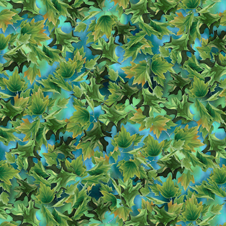 This cotton fabric features green leaves on an aqua blue sky. Available at Colorado Creations Quilting