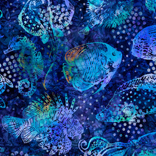 This cotton fabric features tropical fish such as angel fish, seahorse, manta ray, and octopuson a navy blue background. Available at Colorado Creations Quilting
