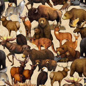 This wildlife fabric featuring bears, moose, elk, bobcats, eagles, wolves and more on tan background