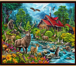 This fabric features a log cabin near a brook with all types of wildlife like bears, elk, raccoons, trout and red foxes nearby.
