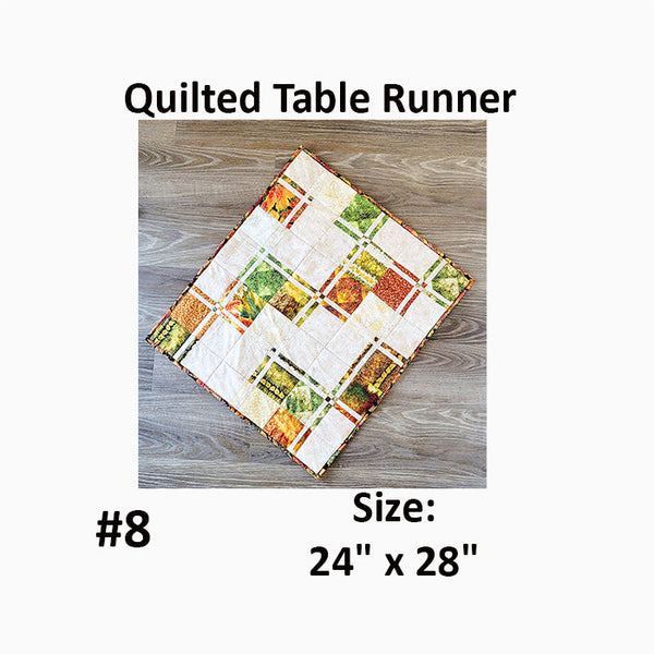 This quilted rectangular runner in fall colors uses a technique called split 9 patch to create the squares within. Designed by Jackie Vujcich.
