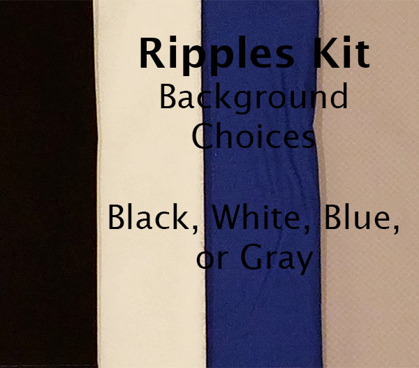The Ripples quilt kit has backgrounds of black, white, blue or gray shown here to choose from.