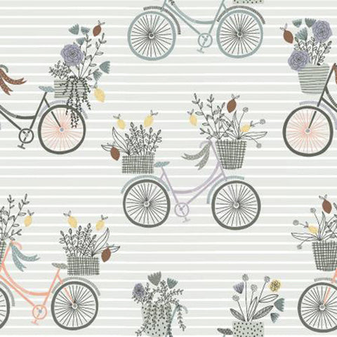 This cotton fabric features darling bikes in shades of gray and peach all carrying a basket of flowers on a sage green background.