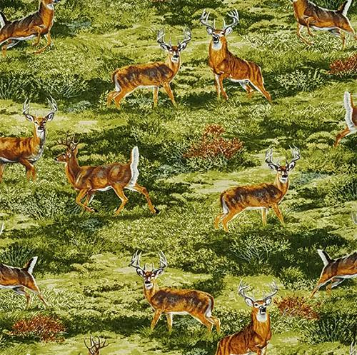 White-tailed deer in a green meadow gaze at you cotton fabric is available at Colorado Creations Quilting