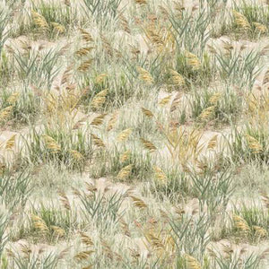 This cotton fabric features images of green beach grass among the sand. Available at Colorado Creations Quilting.