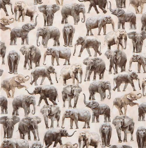 This cotton fabric features elephants on a tan background.