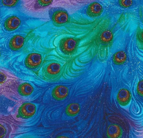 This cotton fabric features beautiful plumes of peacock feathers in rich shades of purple, blue and green and specks of metalic.