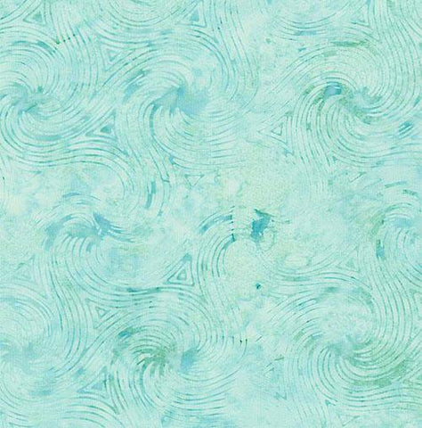 This aqua blue batik cotton fabric features large ocean waves