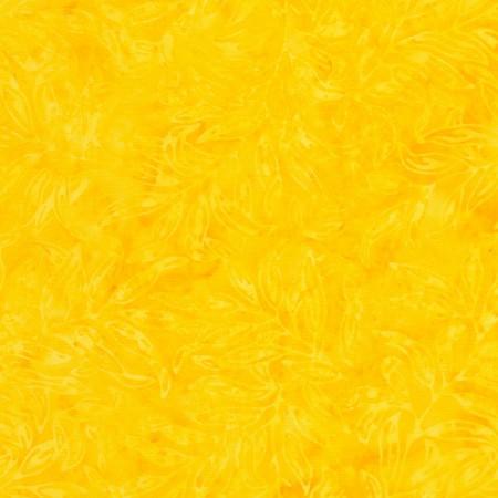 This bright lemon yellow tonal fabric shows a subtle hint of delicate leaves. Available at Colorado Creations Quilting