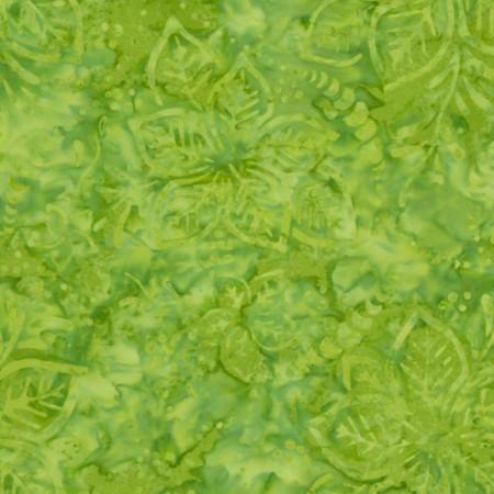 A lime green tonal fabric featuring flowering hibiscus images. Available at Colorado Creations Quilting