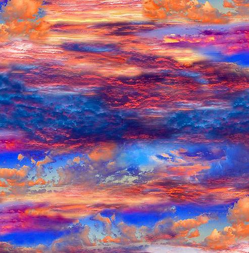 This cotton quilting fabric features a vibrant sunset sky of rich blue with orange and red cloulds by Timeless Treasures and available at Colorado Creations Quilting